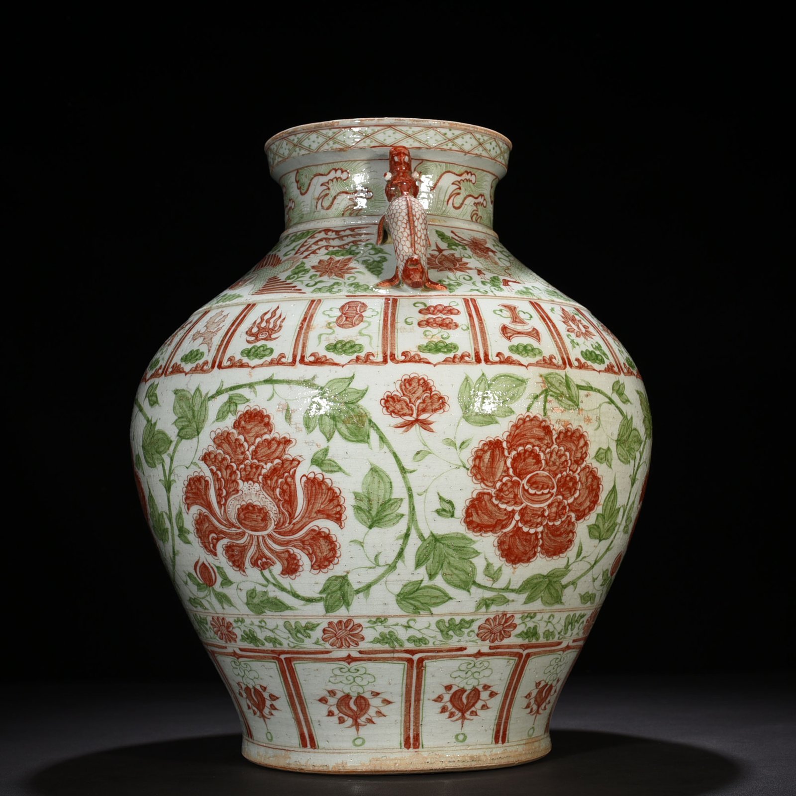 Yuan Dynasty underglaze red and green colored double-eared jar with entangled branches and peony pattern