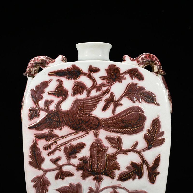 Yuan Dynasty underglaze red engraved peacock and peony pattern four-series flat vase