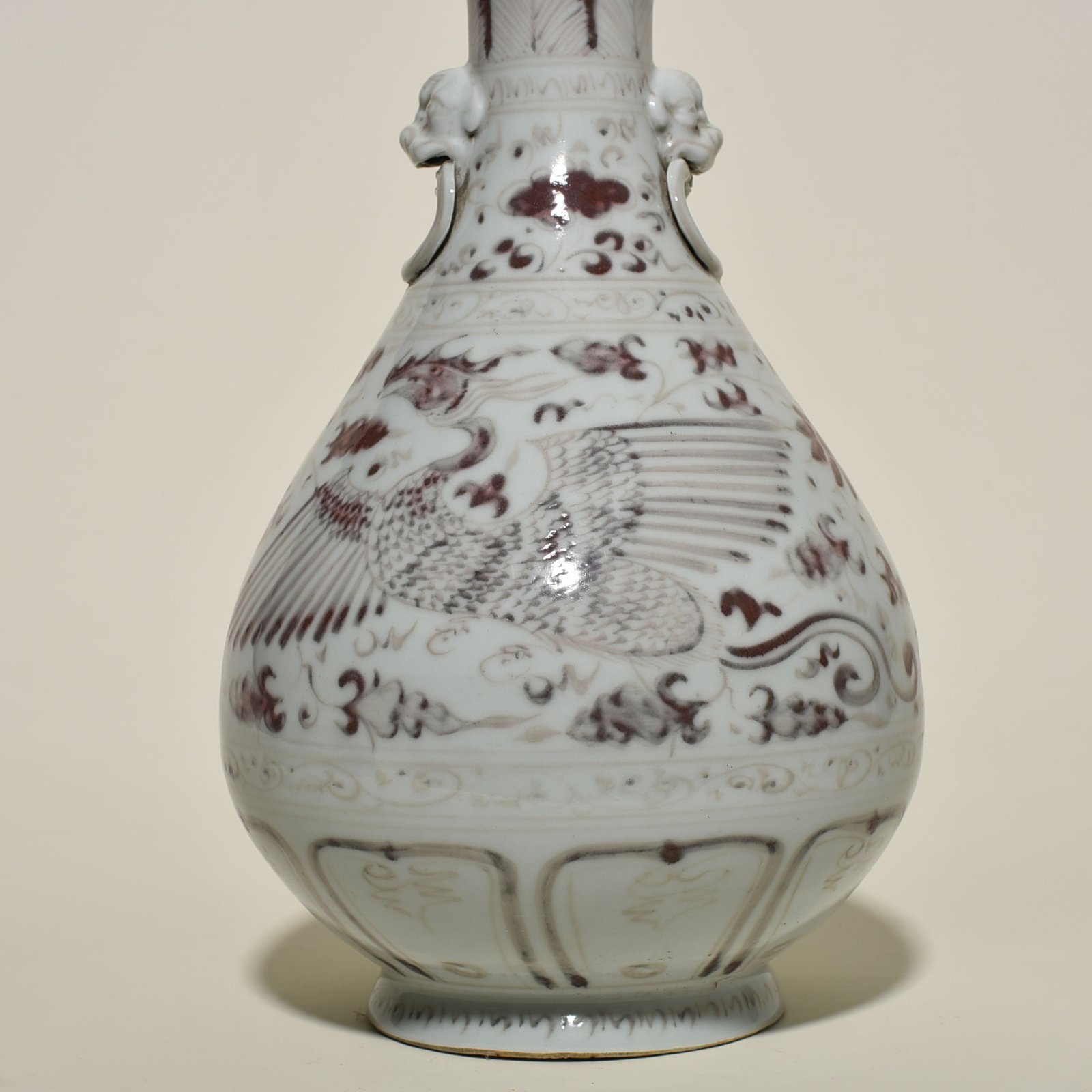 Yuan Dynasty glazed red garlic vase with branches and phoenix pattern