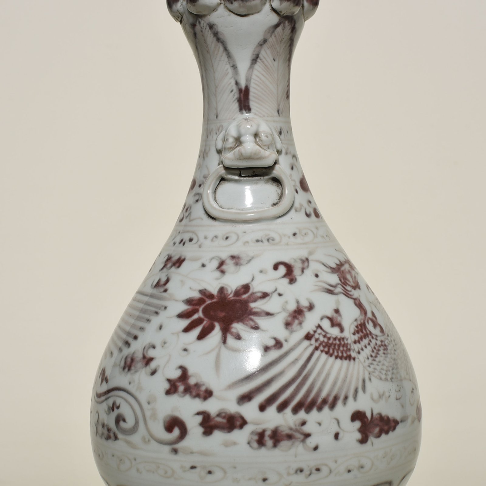 Yuan Dynasty glazed red garlic vase with branches and phoenix pattern