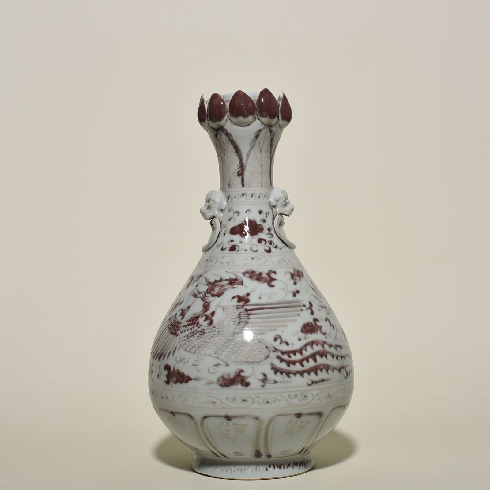 Yuan Dynasty glazed red garlic vase with branches and phoenix pattern