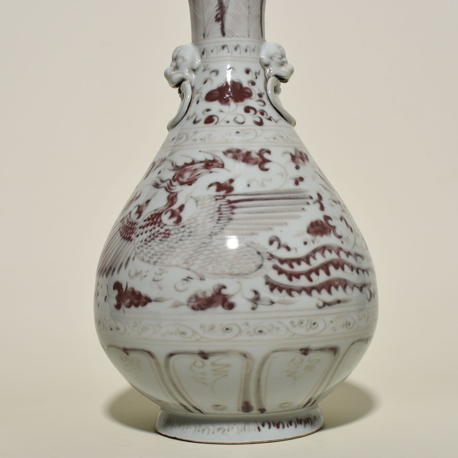 Yuan Dynasty glazed red garlic vase with branches and phoenix pattern
