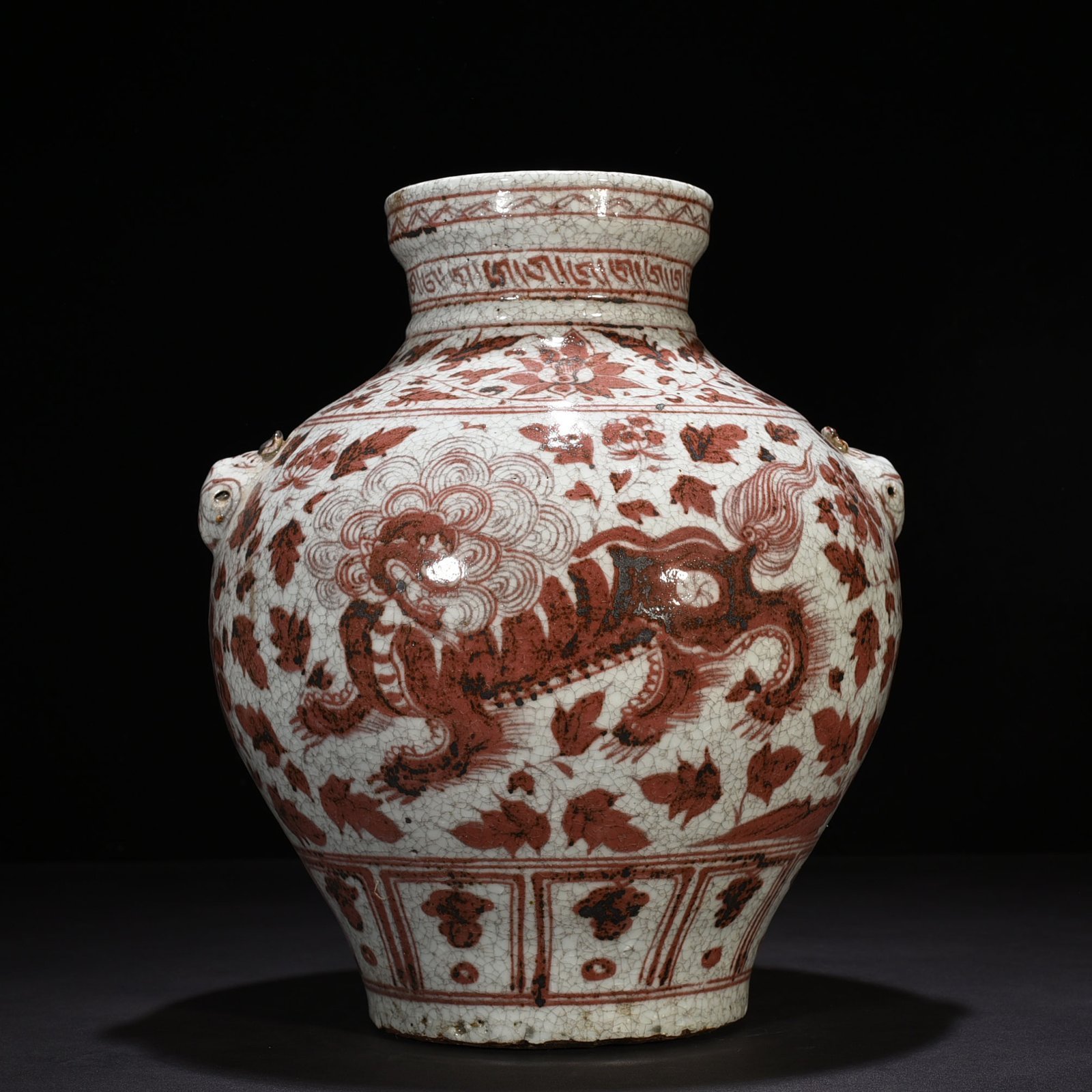 Yuan Dynasty underglaze red lion pattern animal ear jar