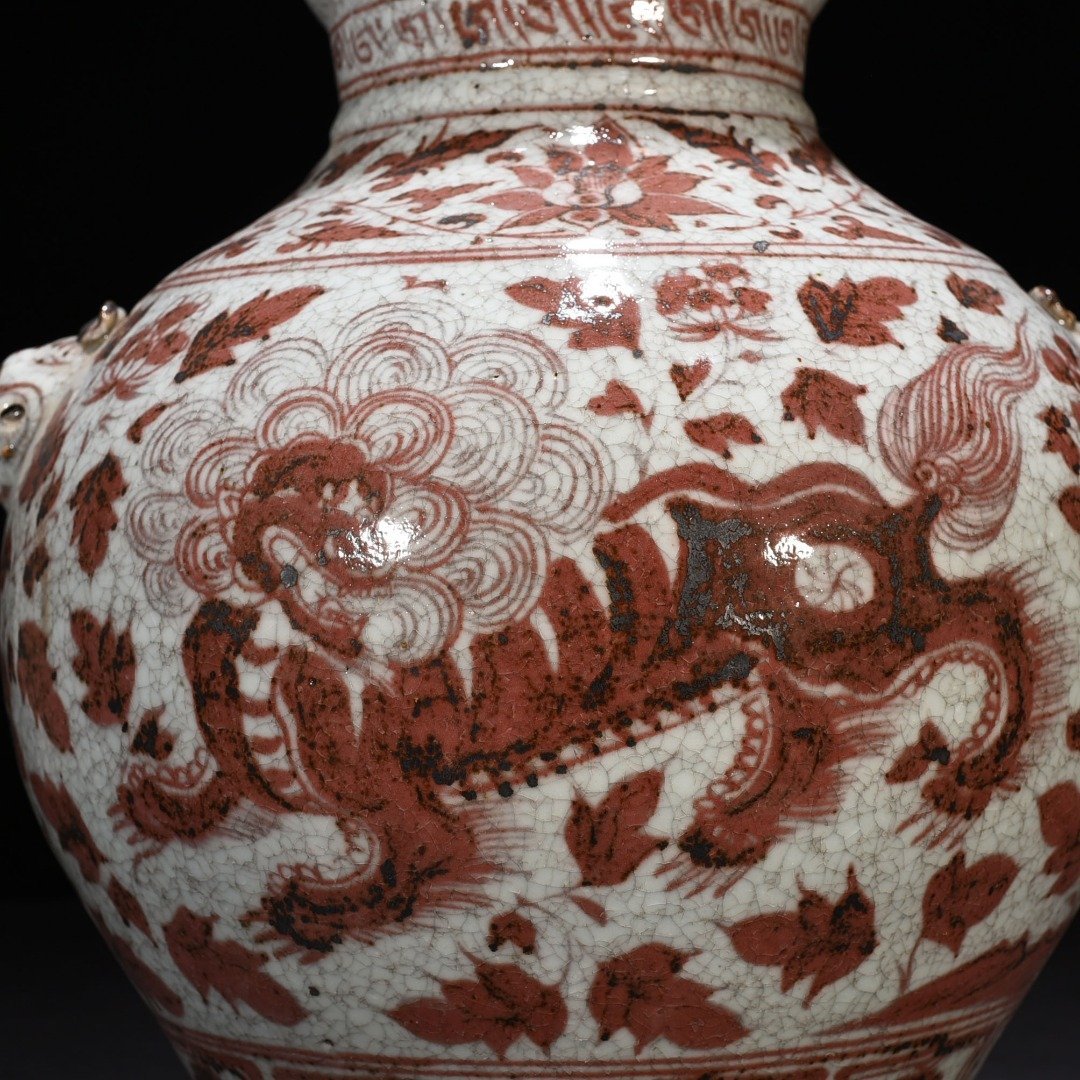 Yuan Dynasty underglaze red lion pattern animal ear jar