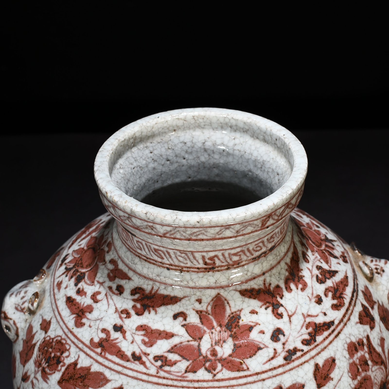 Yuan Dynasty underglaze red lion pattern animal ear jar