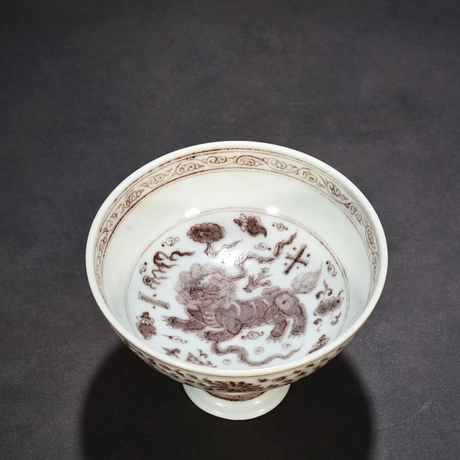 Yuan Dynasty underglaze red tall bowl with branches and lion pattern
