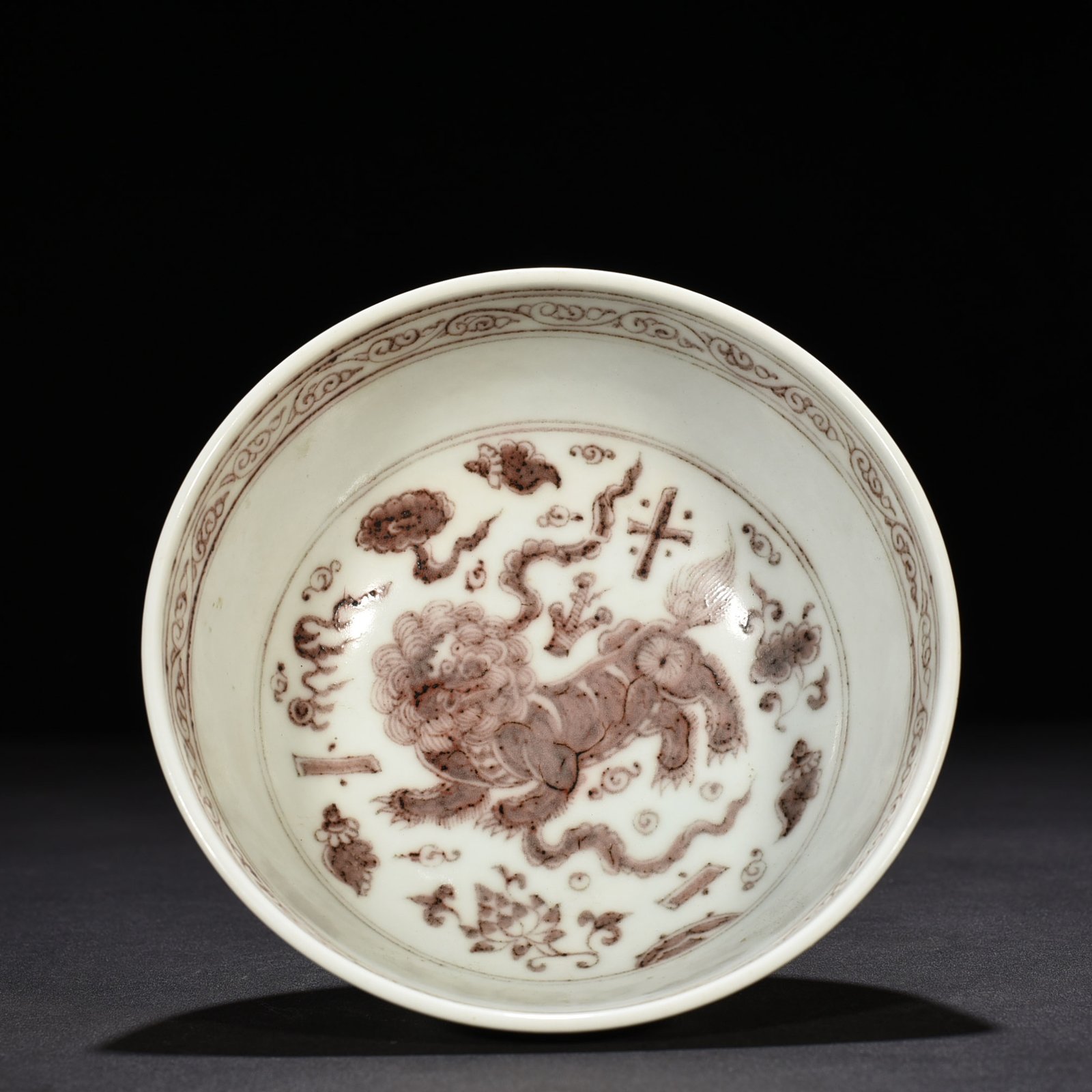 Yuan Dynasty underglaze red tall bowl with branches and lion pattern
