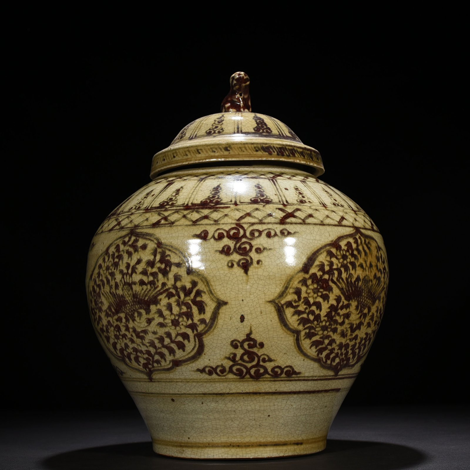 Yuan Dynasty glazed red flower and phoenix pattern covered jar