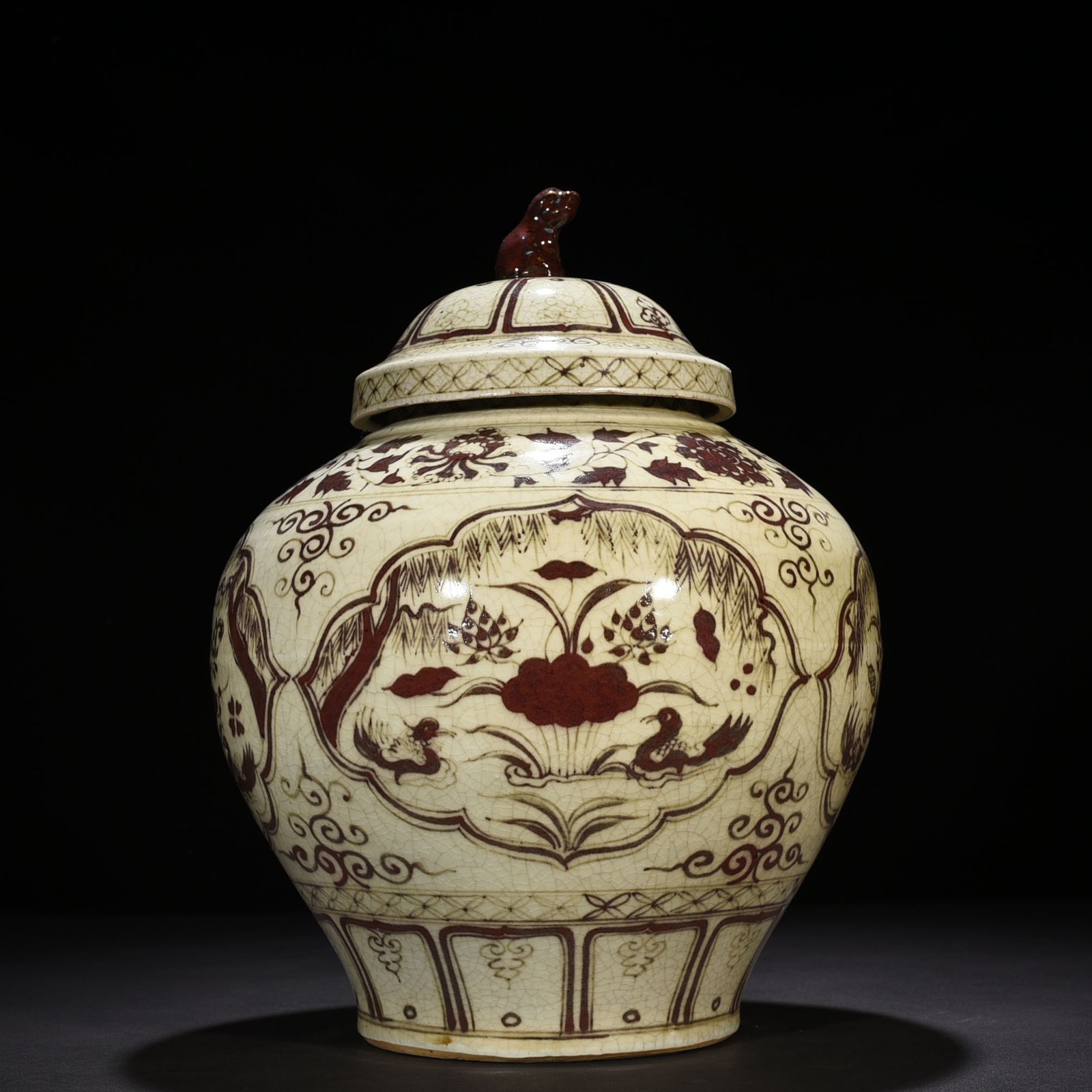 Yuan Dynasty Covered Jar with Underglaze Red Design of Mandarin Ducks in a Lotus Pond
