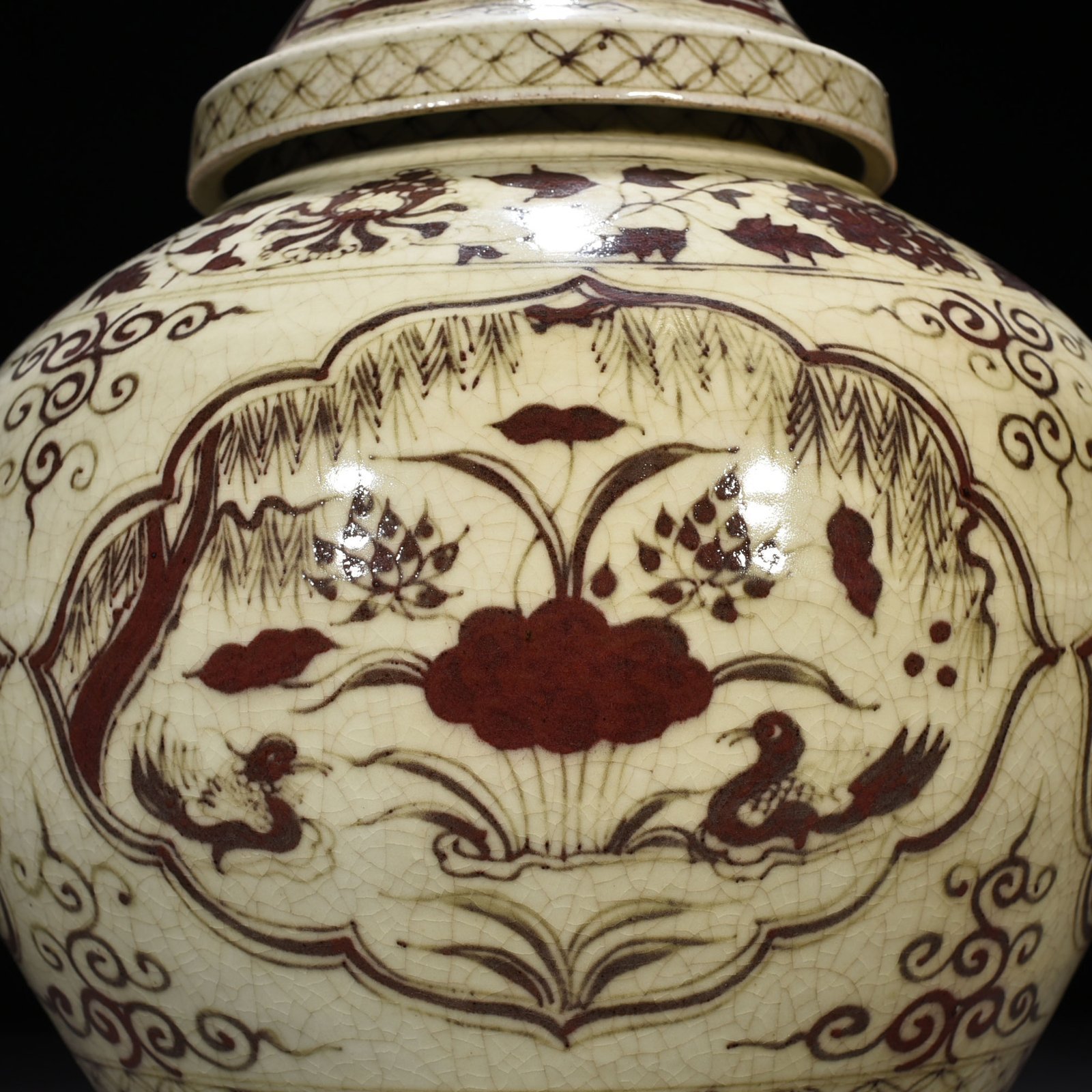 Yuan Dynasty Covered Jar with Underglaze Red Design of Mandarin Ducks in a Lotus Pond