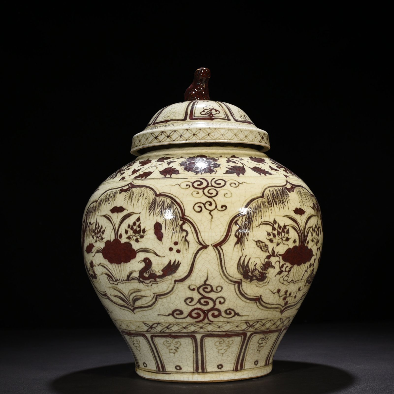 Yuan Dynasty Covered Jar with Underglaze Red Design of Mandarin Ducks in a Lotus Pond