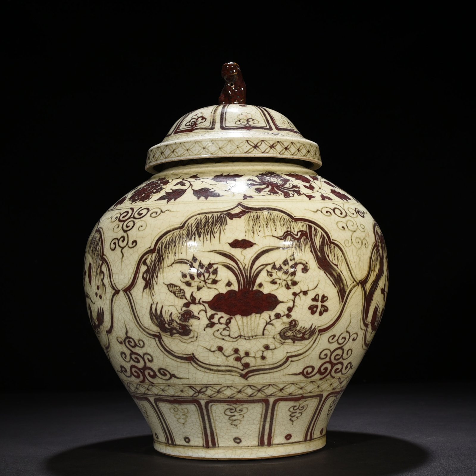 Yuan Dynasty Covered Jar with Underglaze Red Design of Mandarin Ducks in a Lotus Pond