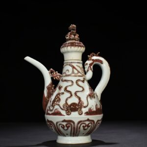 Yuan Dynasty underglaze red embossed lion rolling hydrangea and holding a pot