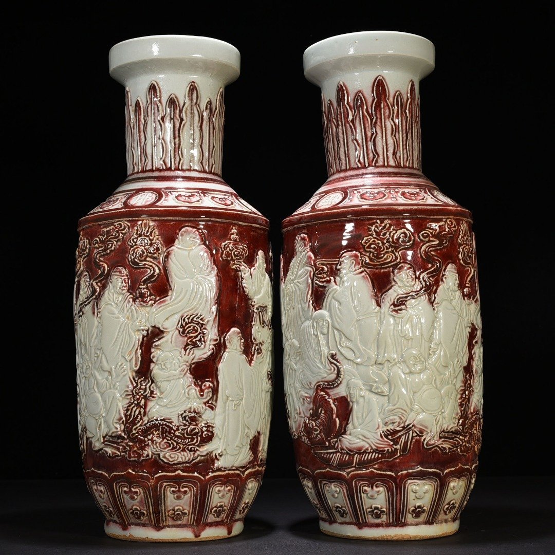 Yuan Dynasty underglaze red and white carved mallet vase with eighteen arhat figures