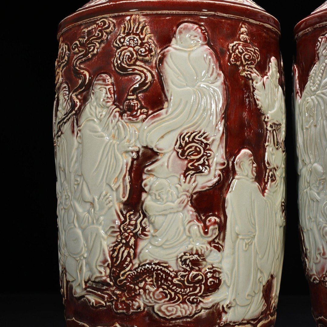 Yuan Dynasty underglaze red and white carved mallet vase with eighteen arhat figures