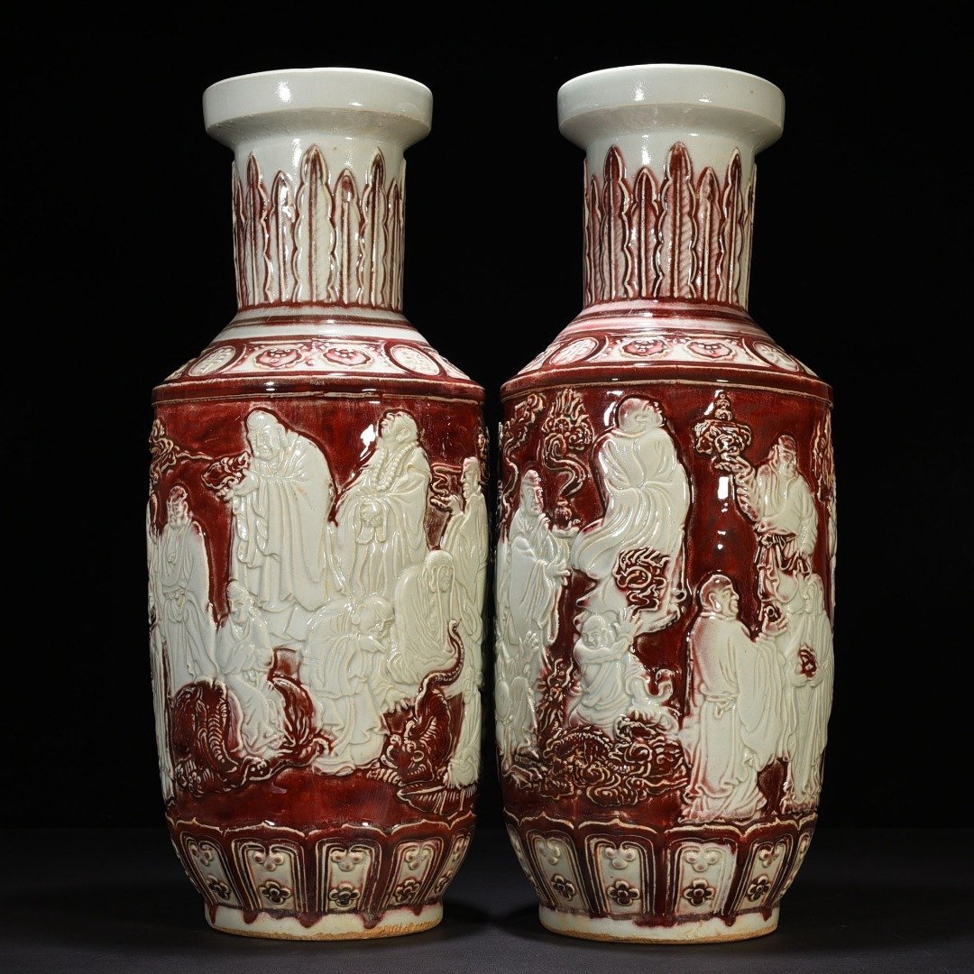 Yuan Dynasty underglaze red and white carved mallet vase with eighteen arhat figures