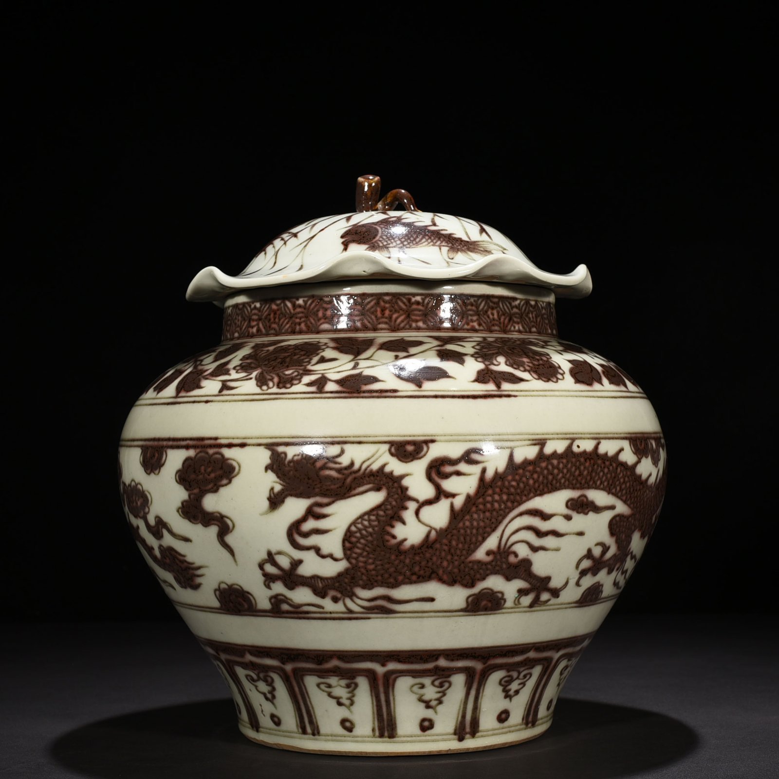 Yuan Dynasty glaze red dragon pattern lotus leaf covered jar