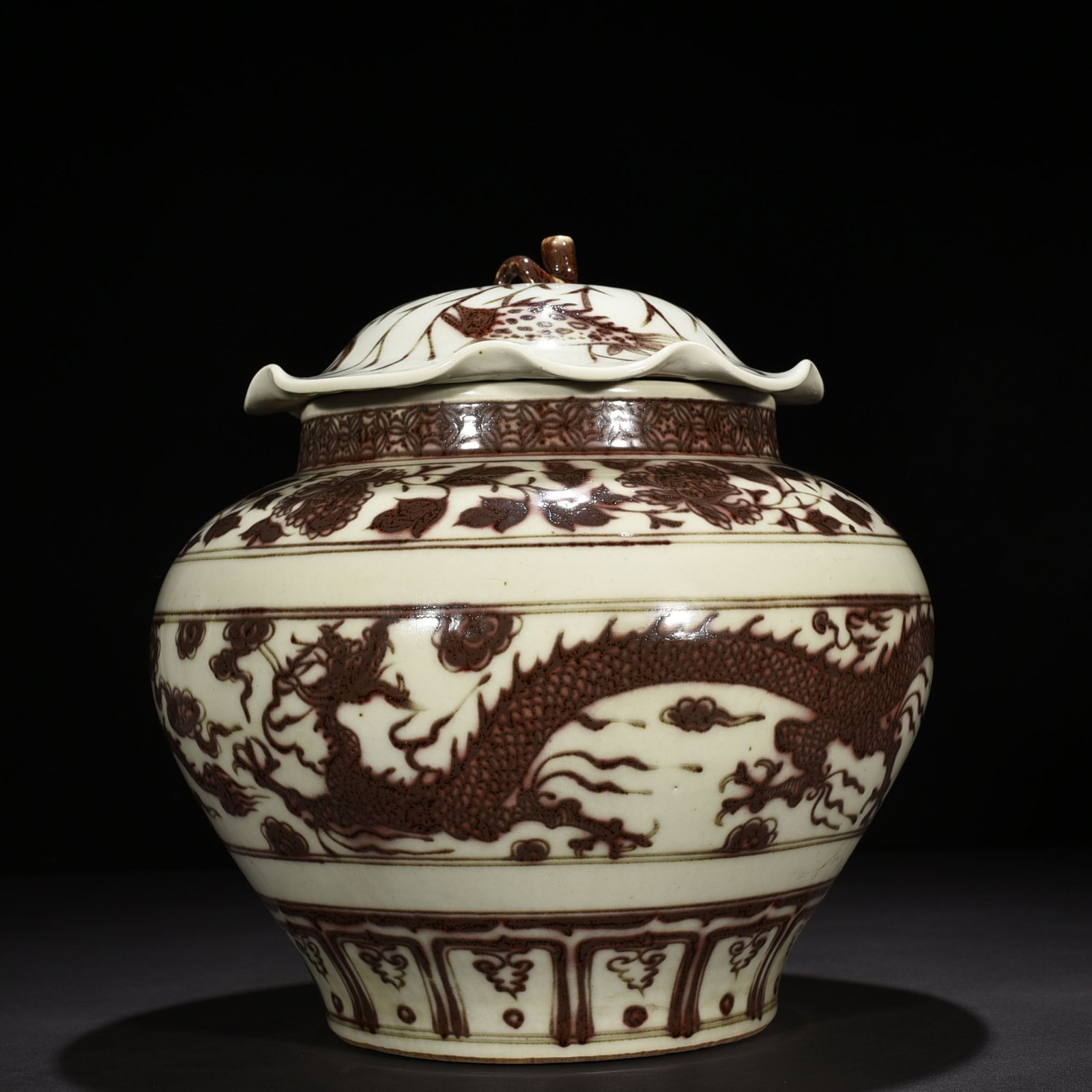 Yuan Dynasty glaze red dragon pattern lotus leaf covered jar