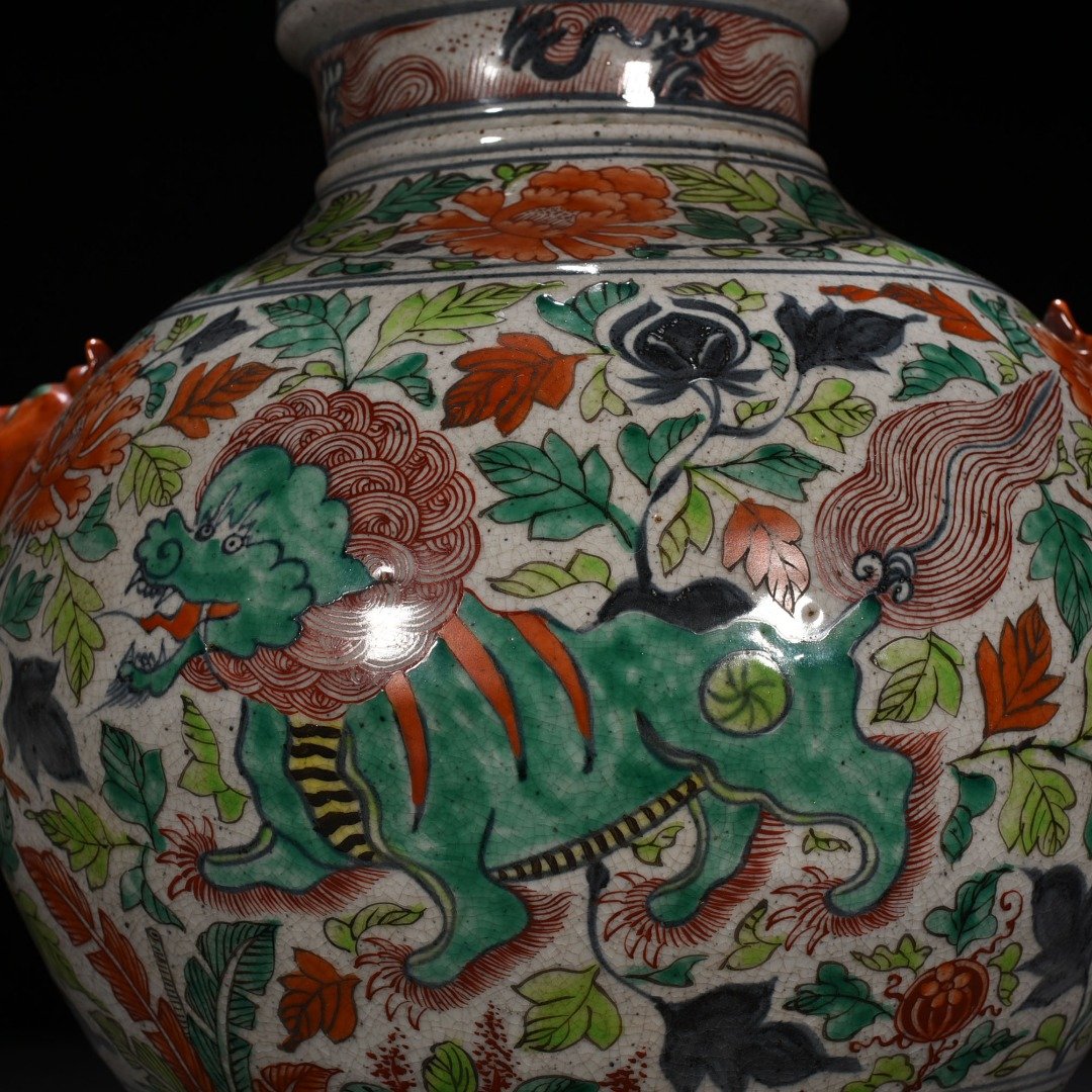 Yuan Dynasty blue and white multicolored animal ear jar with entwined branches and lion pattern