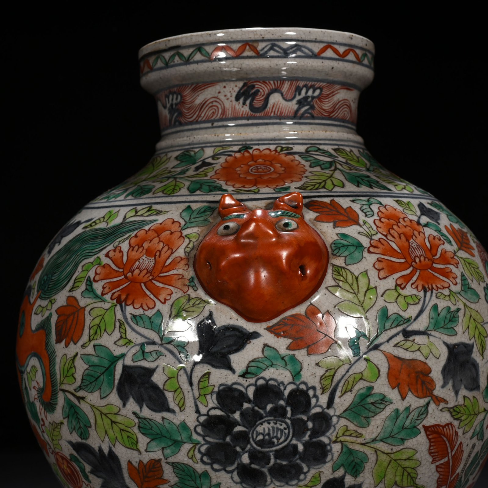 Yuan Dynasty blue and white multicolored animal ear jar with entwined branches and lion pattern