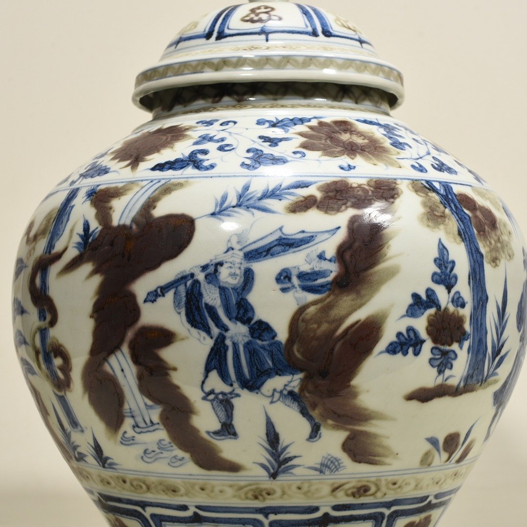 Yuan Dynasty blue and white underglaze red three-story thatched cottage covered jar