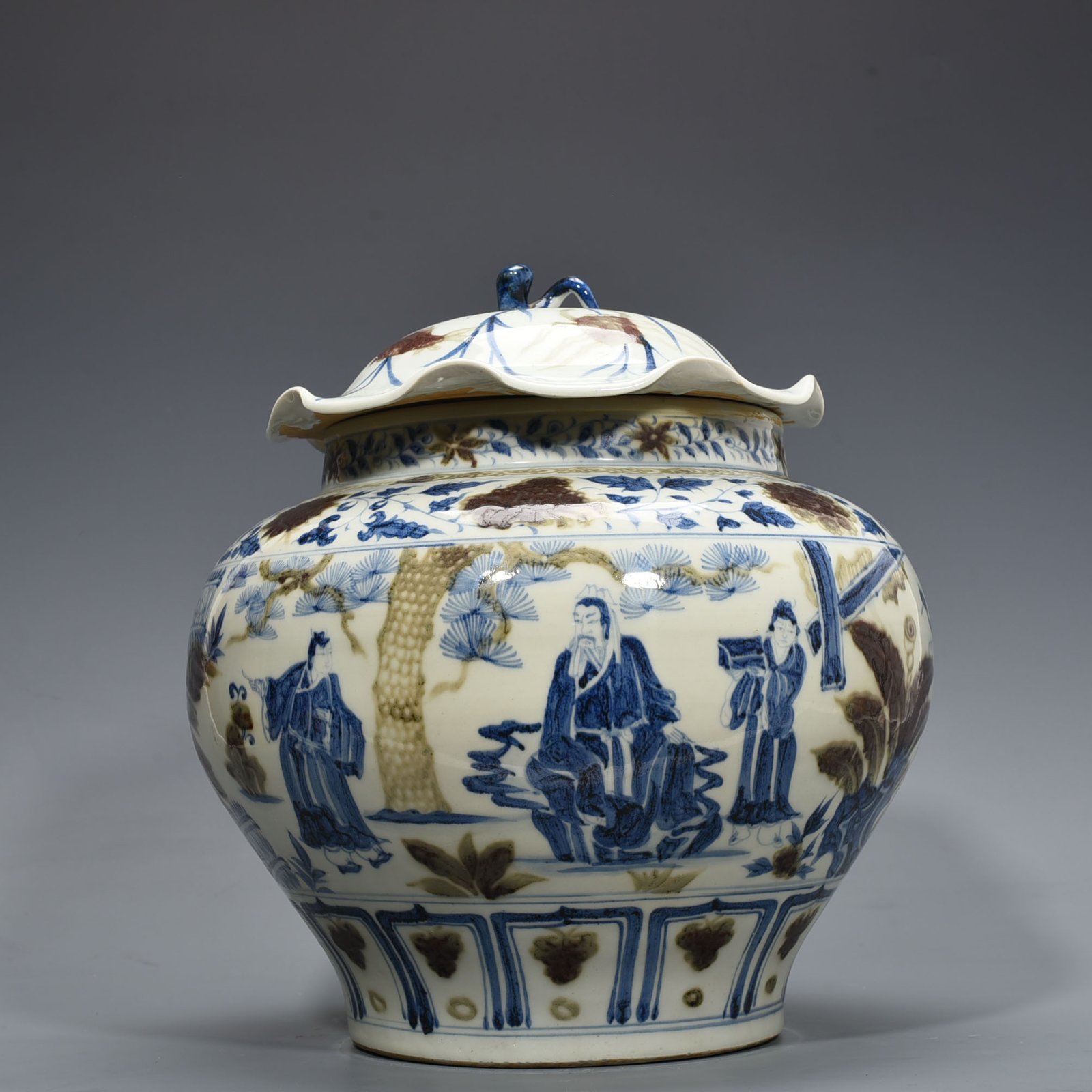 Yuan Dynansty blue and white underglaze red three-story thatched cottage lotus leaf covered jar