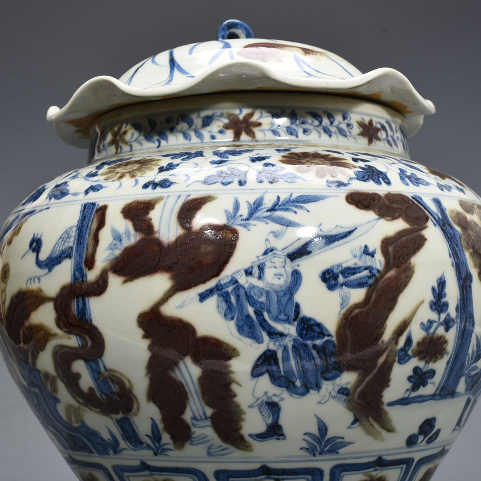 Yuan Dynansty blue and white underglaze red three-story thatched cottage lotus leaf covered jar