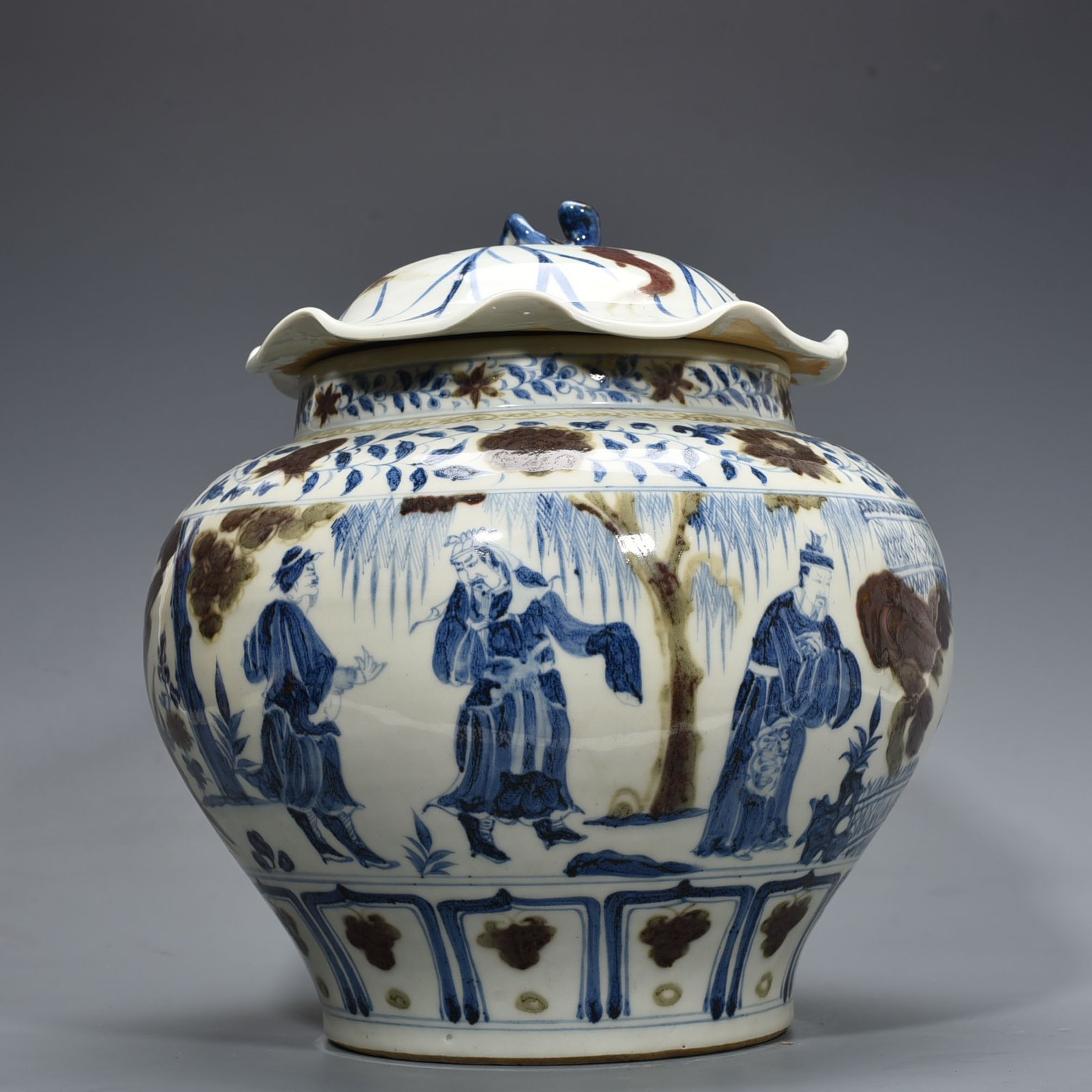 Yuan Dynansty blue and white underglaze red three-story thatched cottage lotus leaf covered jar