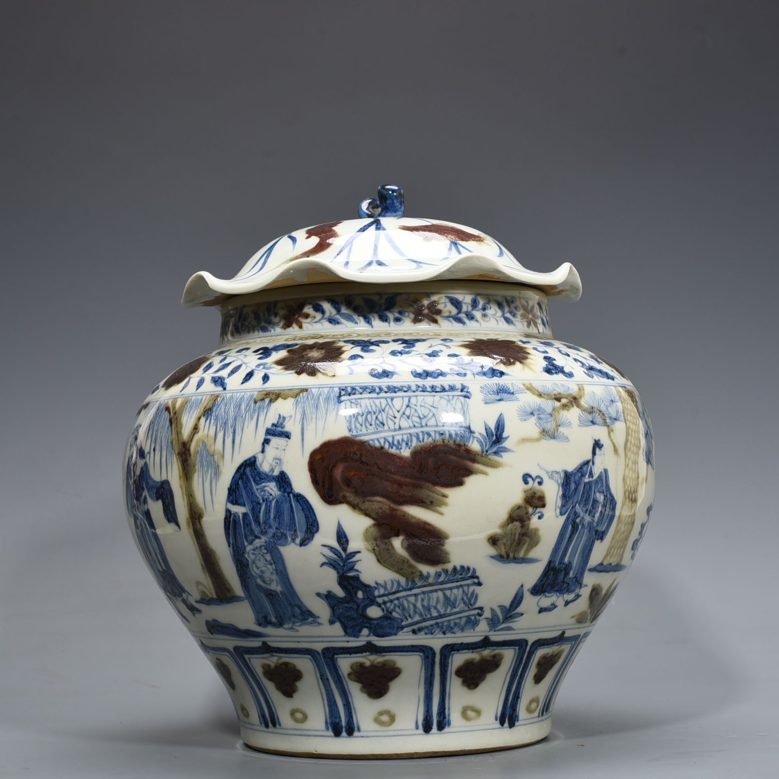 Yuan Dynansty blue and white underglaze red three-story thatched cottage lotus leaf covered jar