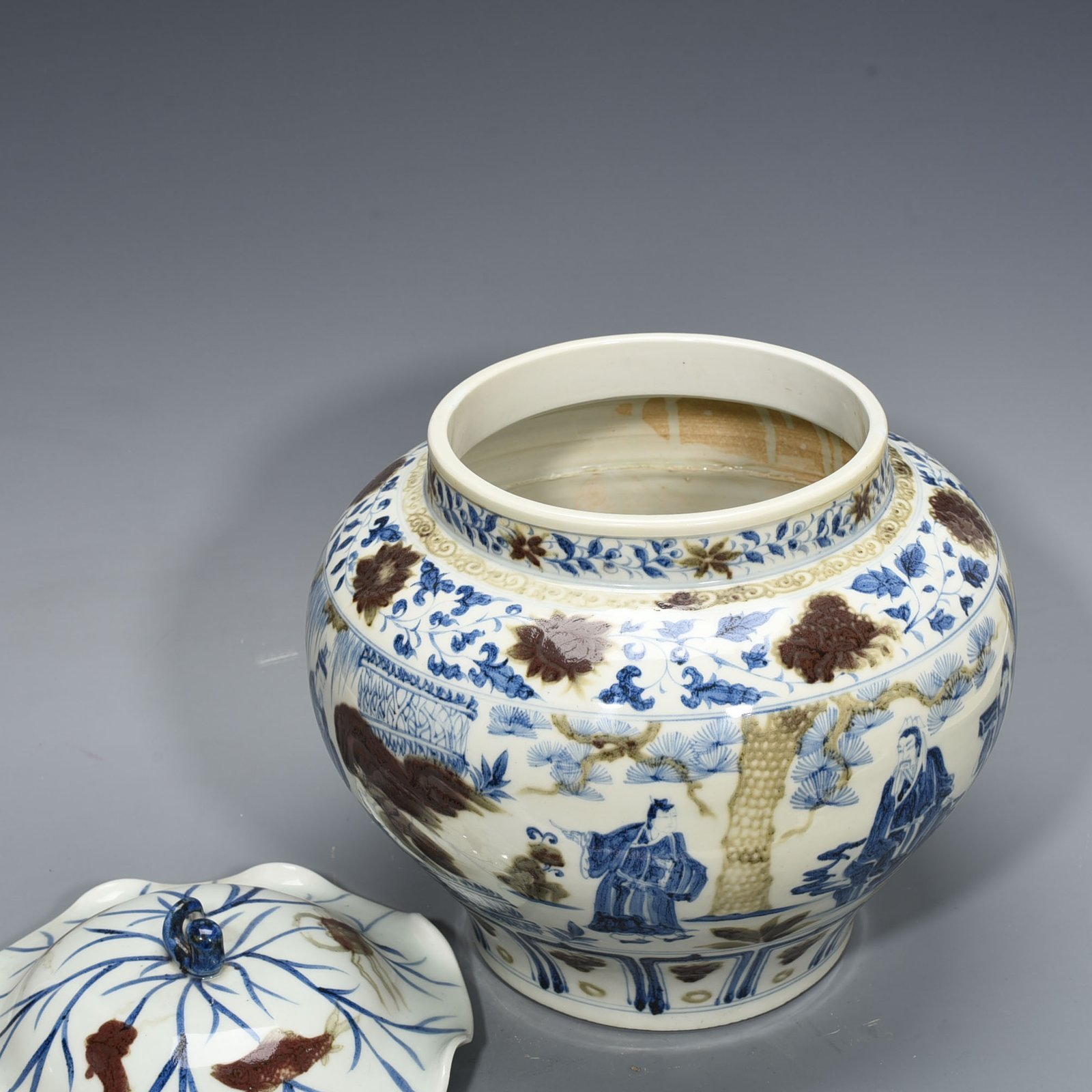 Yuan Dynansty blue and white underglaze red three-story thatched cottage lotus leaf covered jar