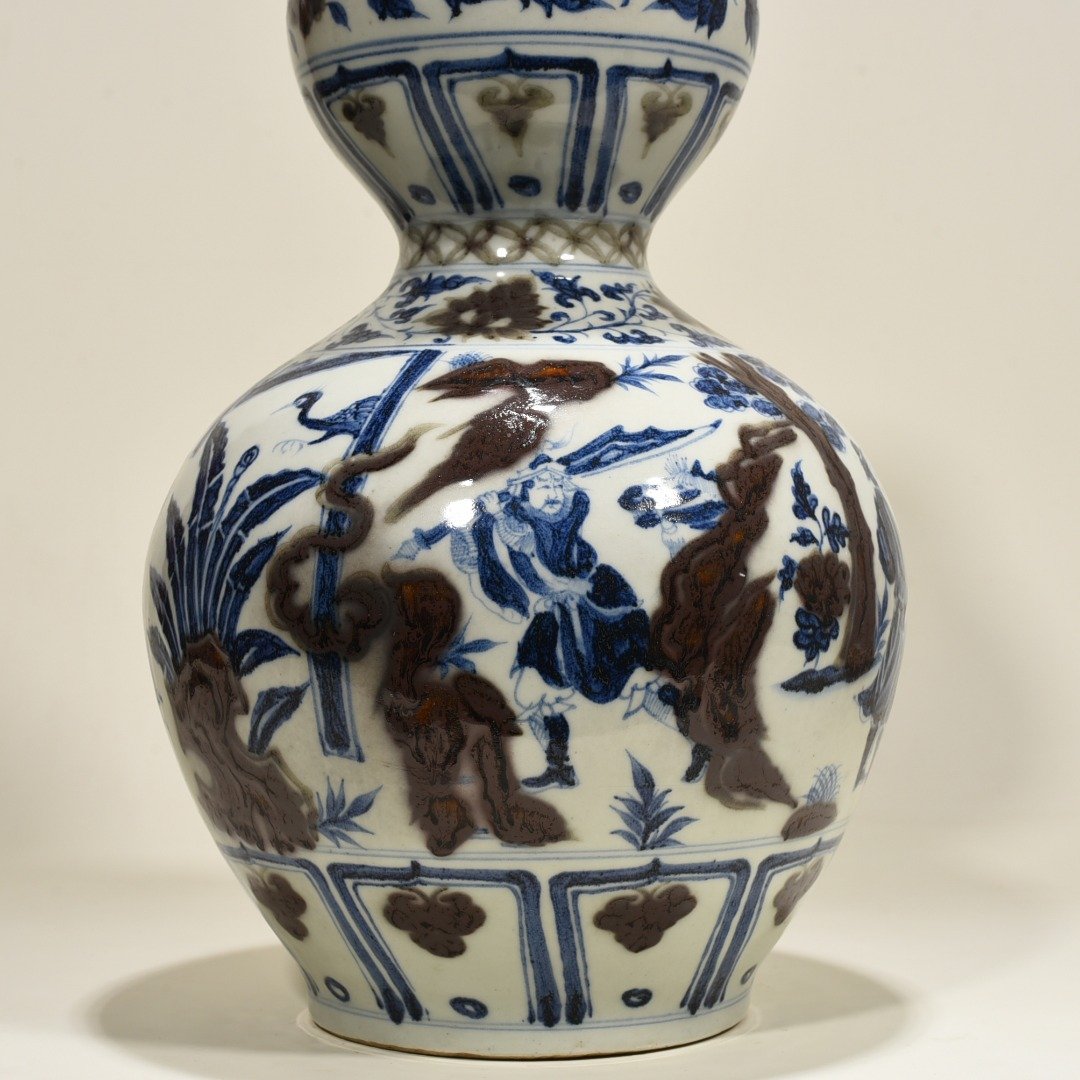 Yuan Dynasty blue and white underglaze red gourd vase with three-story thatched cottage character pattern