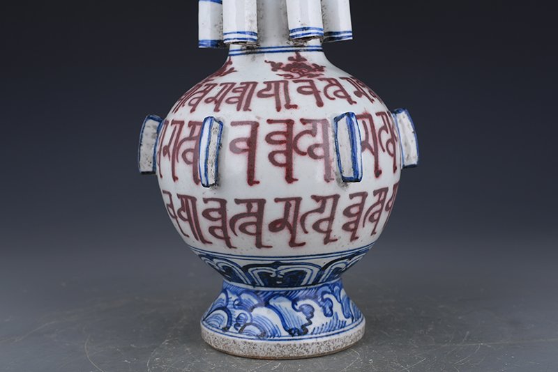 Yuan Dynasty blue and white underglaze red Sanskrit multi-tube bottle