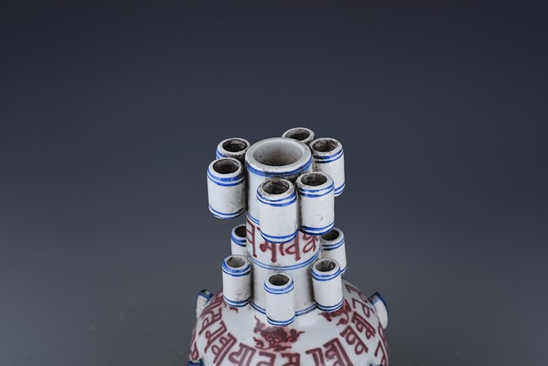 Yuan Dynasty blue and white underglaze red Sanskrit multi-tube bottle