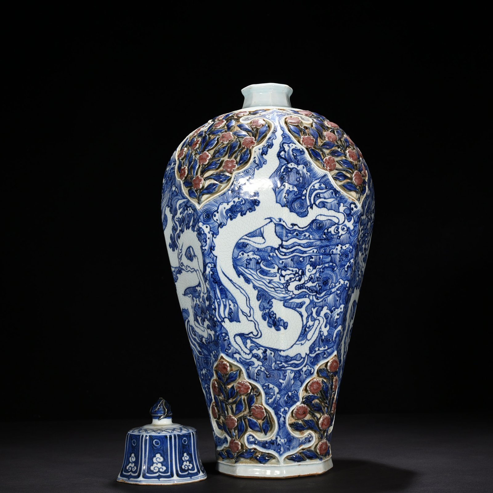 Yuan Dynasty blue and white underglaze red plastic four-season flower engraved with sea water and dragon pattern octagonal plum vase