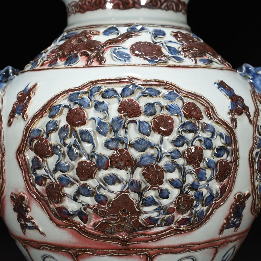 Yuan Dynasty blue and white underglaze red plastic animal ear jar with four seasons flower pattern