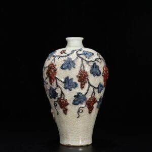 Yuan Dynasty blue and white underglaze red plastic plum vase with grape pattern
