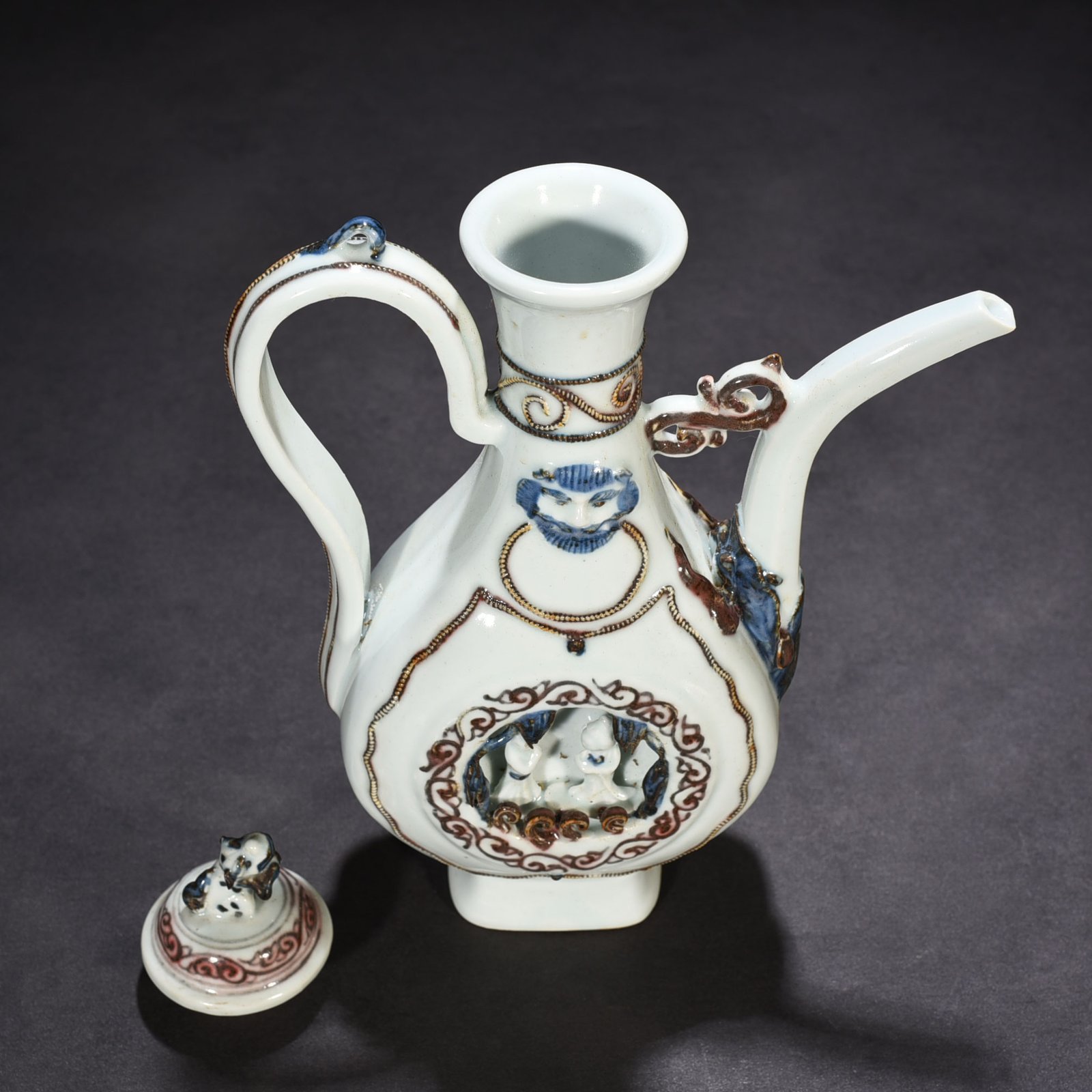Yuan Dynasty blue and white underglaze red hollow figure pattern square-handled teapot
