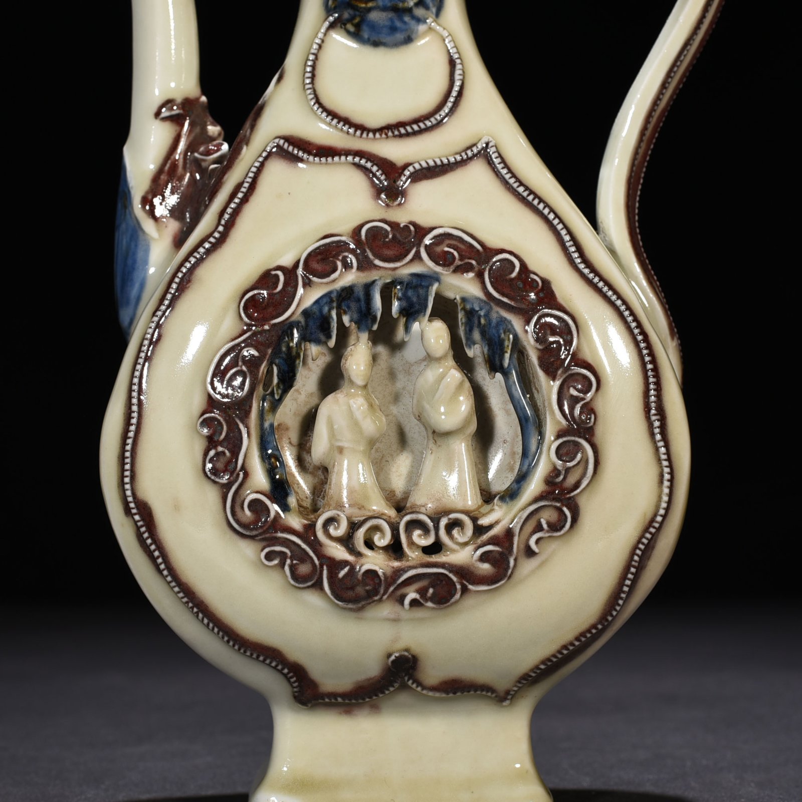 Yuan Dynasty blue and white underglaze red hollow figure-shaped square-handled teapot