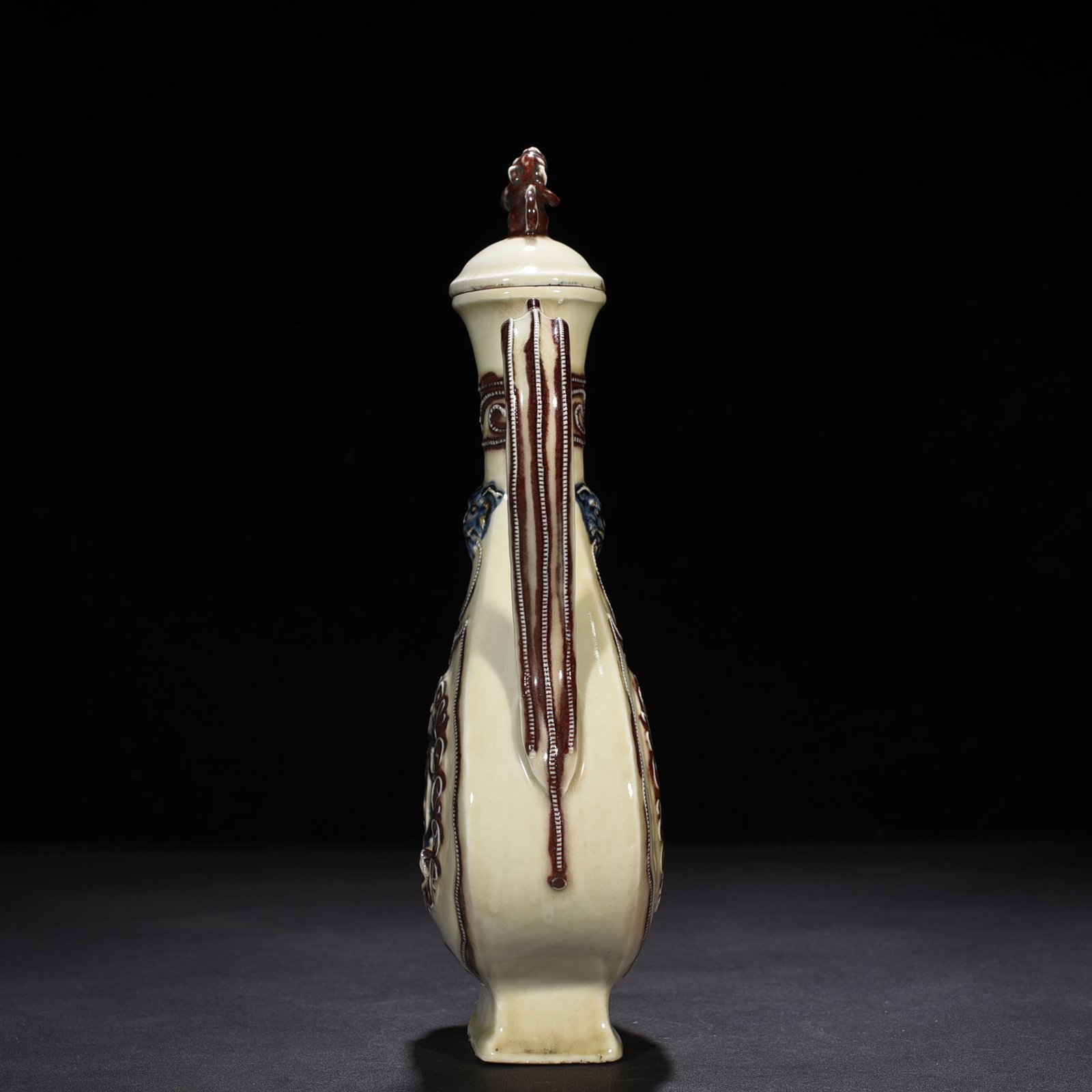 Yuan Dynasty blue and white underglaze red hollow figure-shaped square-handled teapot