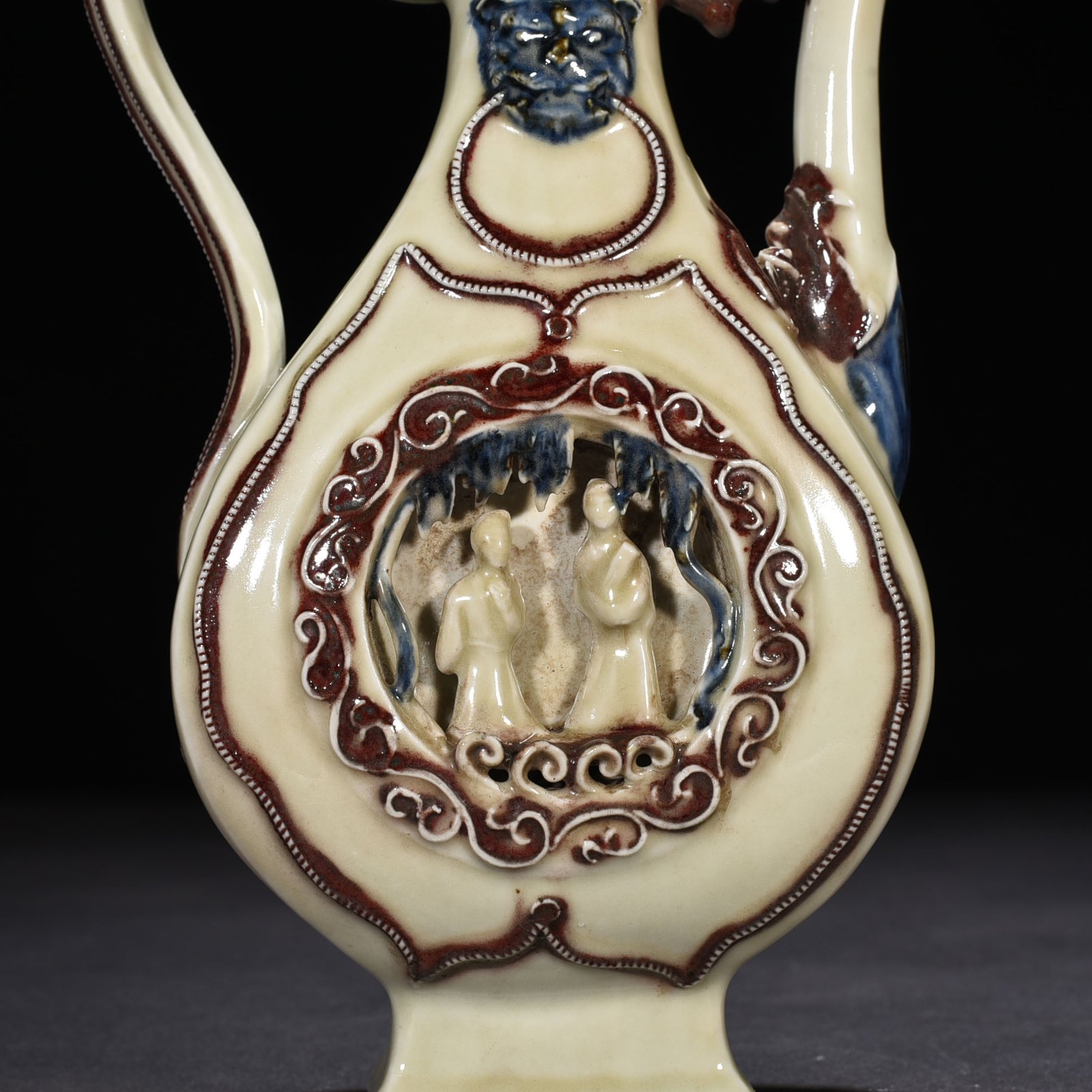 Yuan Dynasty blue and white underglaze red hollow figure-shaped square-handled teapot