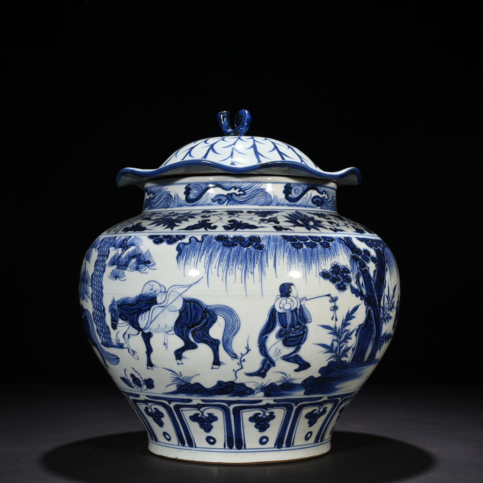 Yuan Dynasty Sblue and white inscribed lotus leaf covered jar