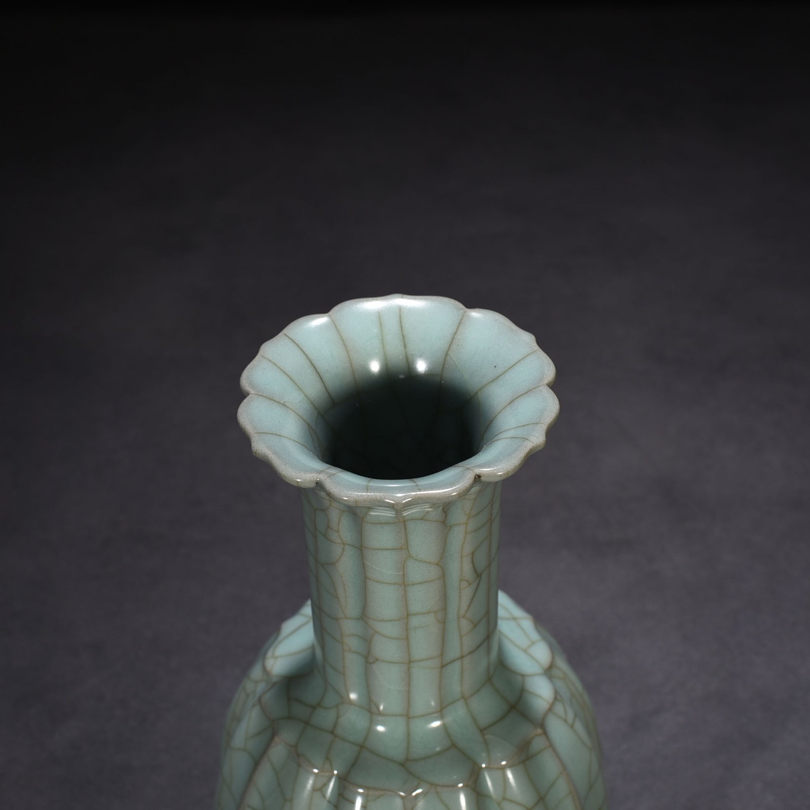 Song Dynasty official kiln celadon glazed melon rattle bell statue