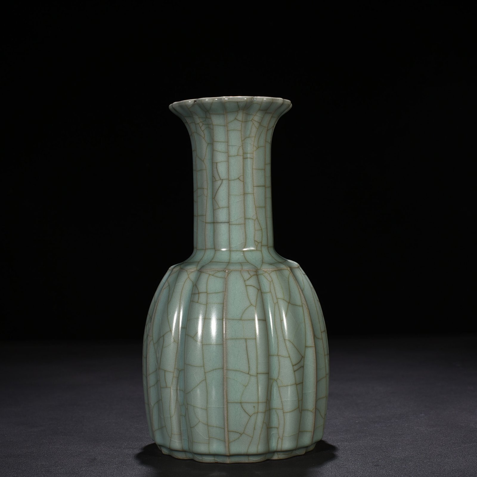Song Dynasty official kiln celadon glazed melon rattle bell statue