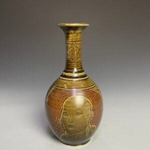 Song Dynasty Ding kiln carved figure-shaped long-neck bottle