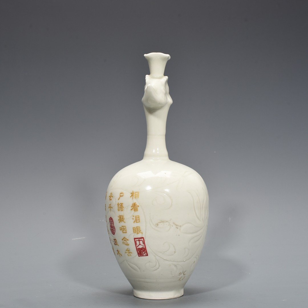Song Dynasty Ding kiln engraved imperial inscription phoenix head pot