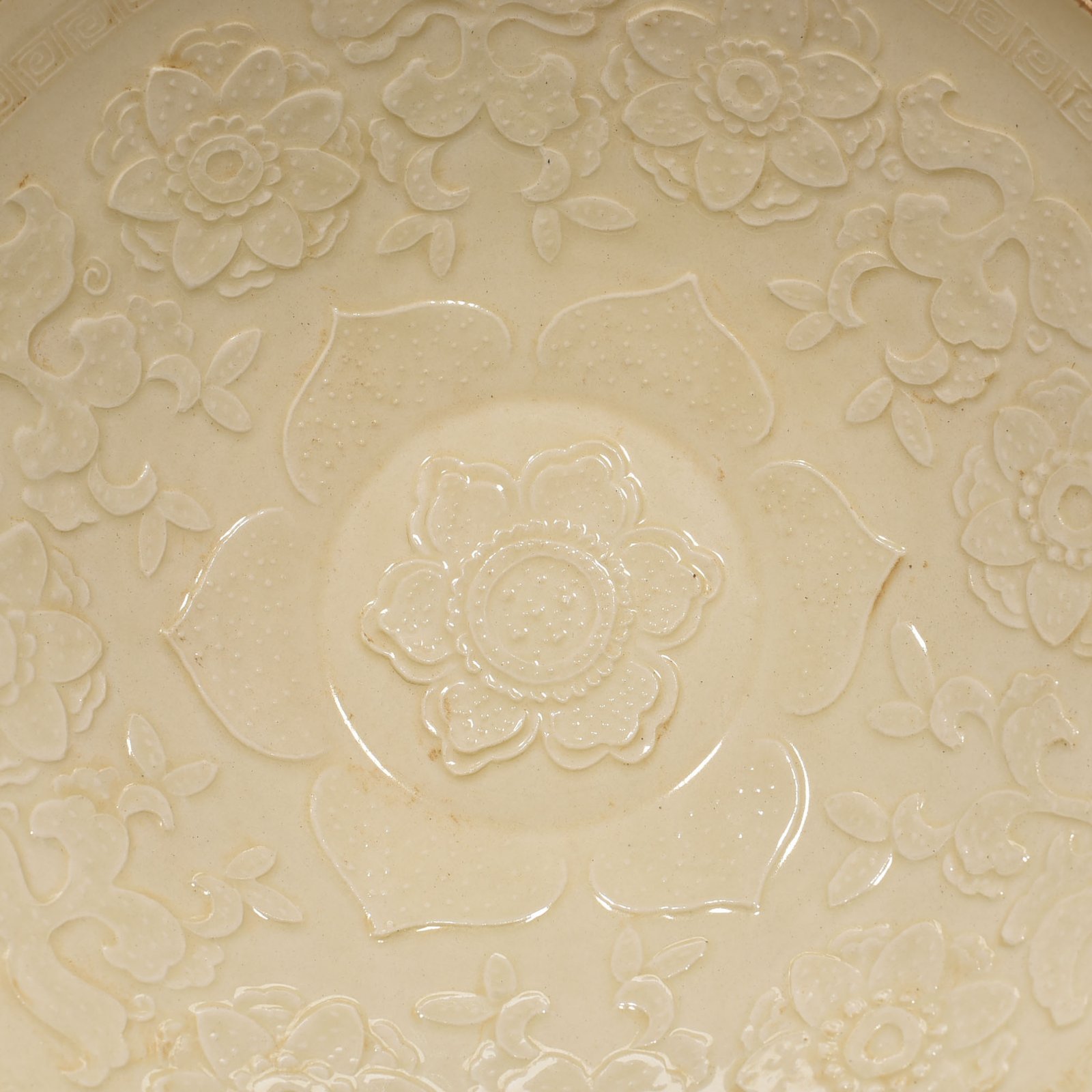 Song Dynasty Ding kiln carved flower pattern bowl