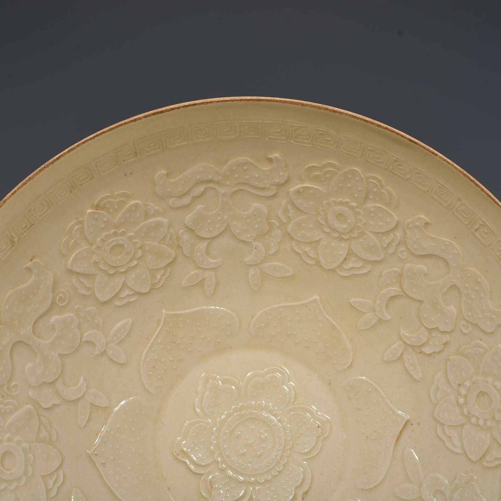 Song Dynasty Ding kiln carved flower pattern bowl