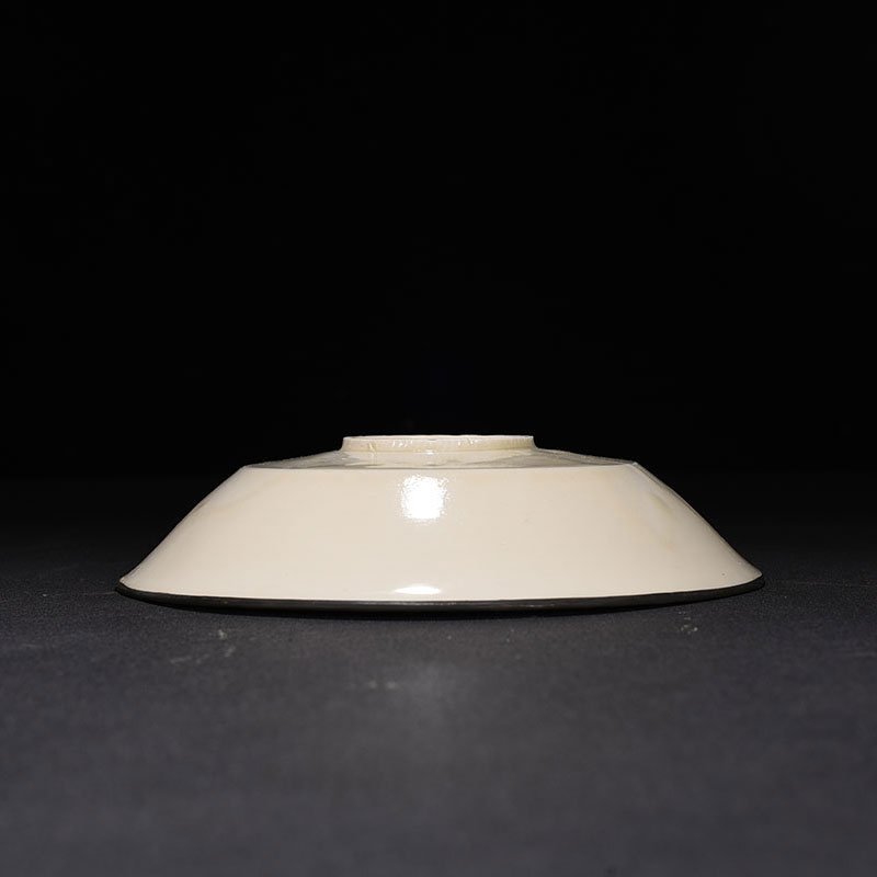 Song Dynasty Ding kiln carved flower pattern bowl