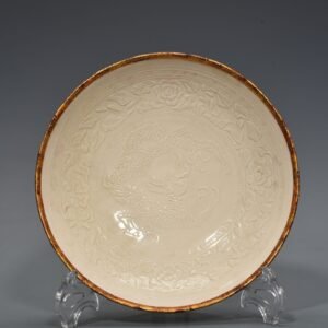 Song Dynasty Ding kiln carved flower and dragon pattern plate