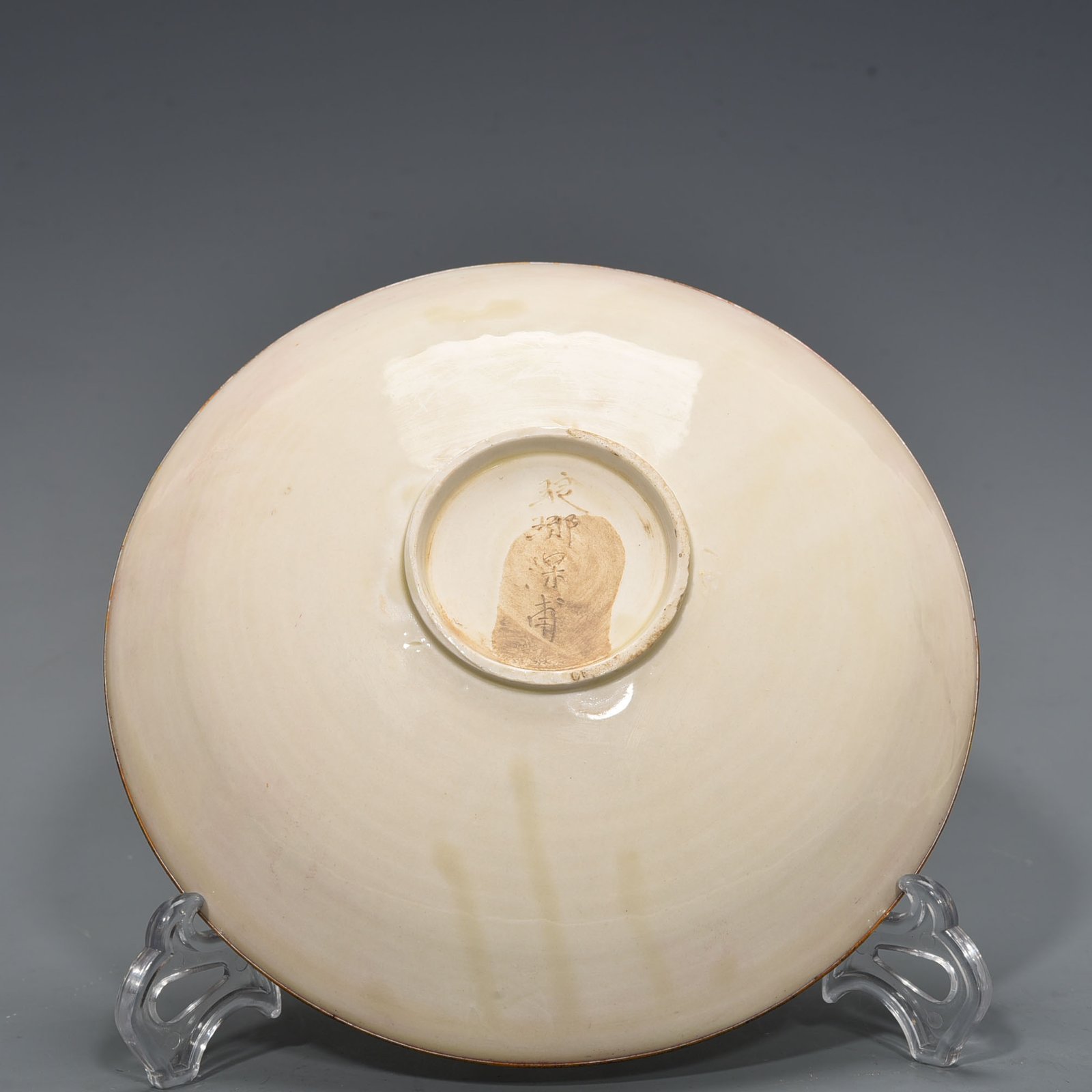 Song Dynasty Ding kiln carved flower and dragon pattern plate